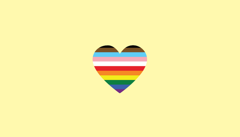 Pride rainbow heart on a light yellow background