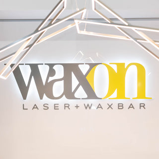 WAXON Laser + Waxbar illuminated sign