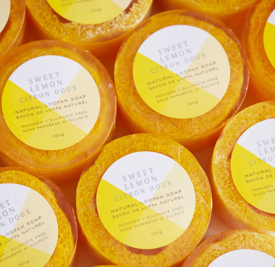 Multiple round Sweet Lemon loofa soaps shot from above